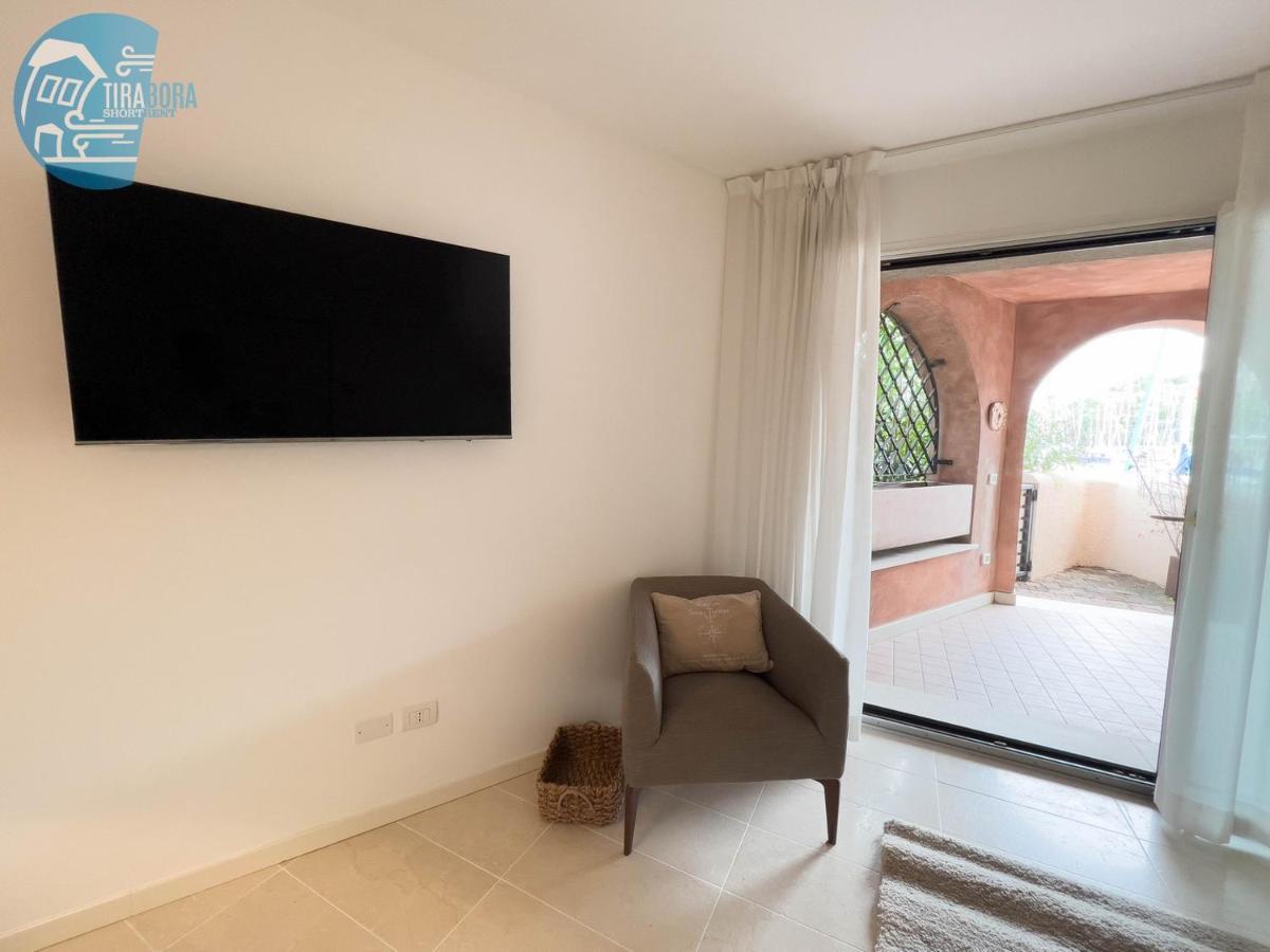 Апартаменты Porto San Rocco Tirabora Short Rent Муджа Экстерьер фото