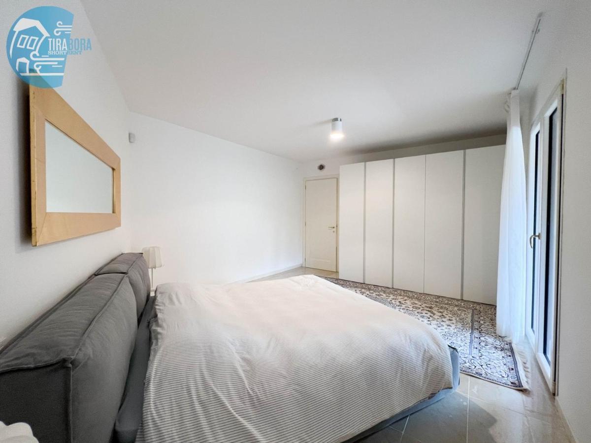 Апартаменты Porto San Rocco Tirabora Short Rent Муджа Экстерьер фото