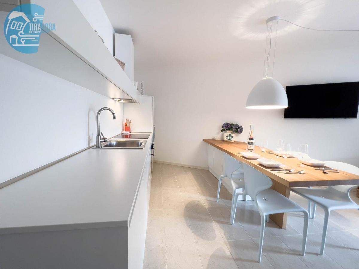 Апартаменты Porto San Rocco Tirabora Short Rent Муджа Экстерьер фото