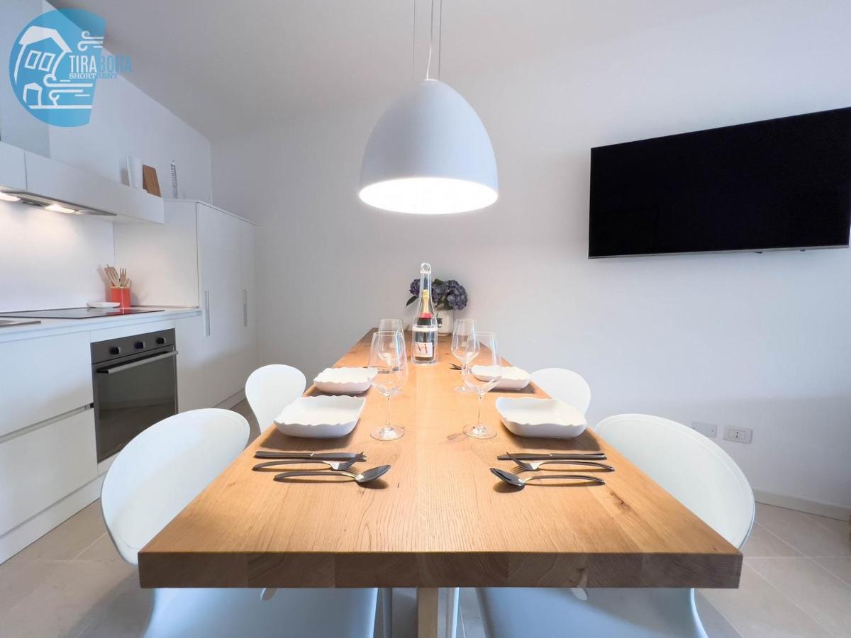Апартаменты Porto San Rocco Tirabora Short Rent Муджа Экстерьер фото